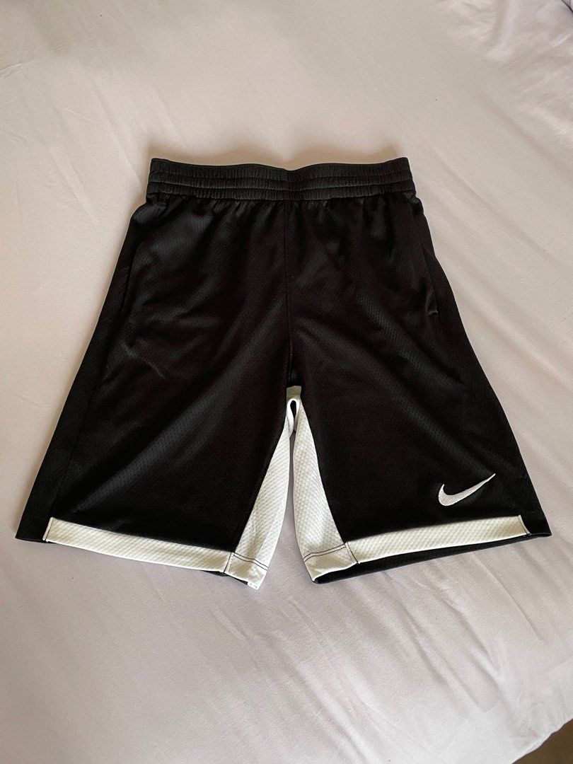 White nike shorts with black trim top