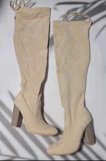 Thigh high fashion boots