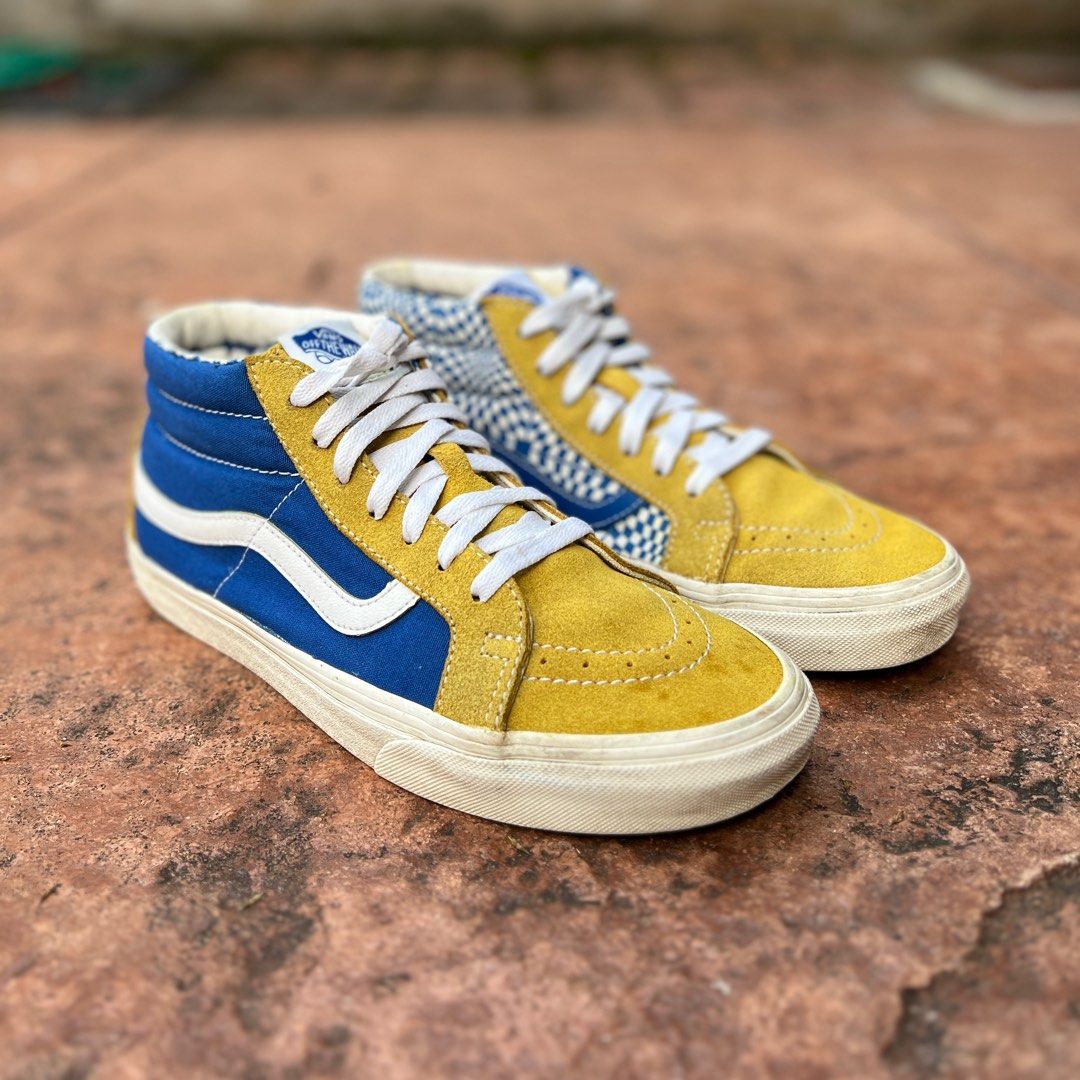 Yellow blue store and white vans
