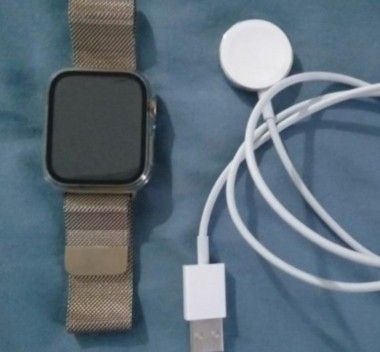 Apple watch gold stainless steel case with gold milanese loop outlet