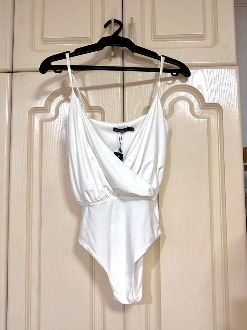 Bochoo White Silk Bodysuit (Category: Sleeveless) located in Quezon City. Submitted by shopfinesse (Listing ID 1262924296, Image 1). Description: .