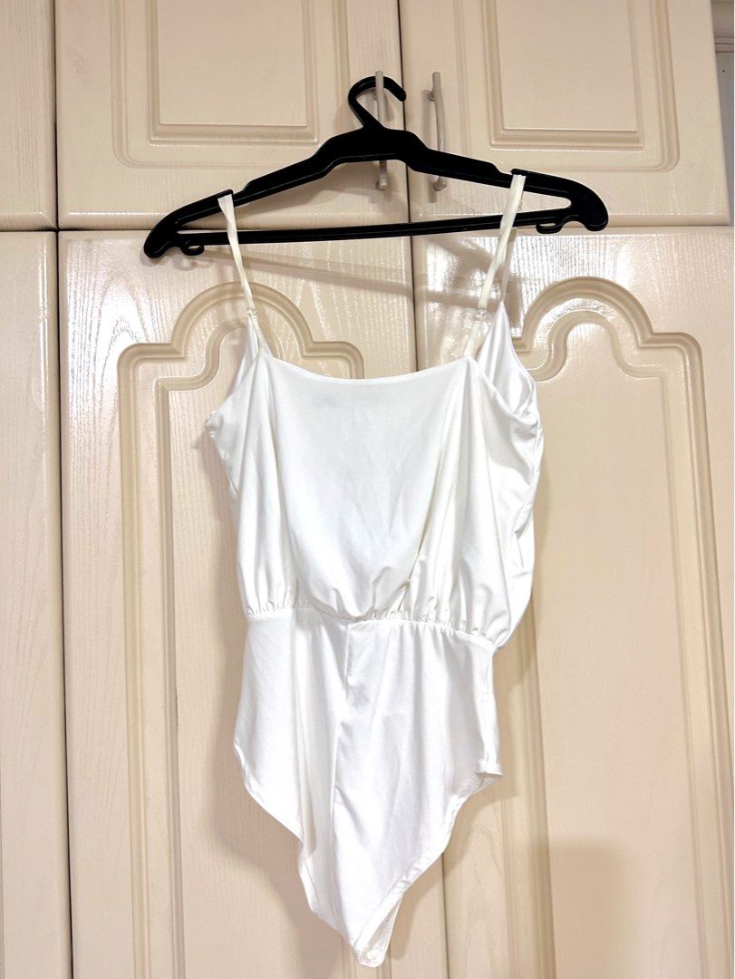 Bochoo White Silk Bodysuit (Category: Sleeveless) located in Quezon City. Submitted by shopfinesse (Listing ID 1262924296, Image 2). Description: .