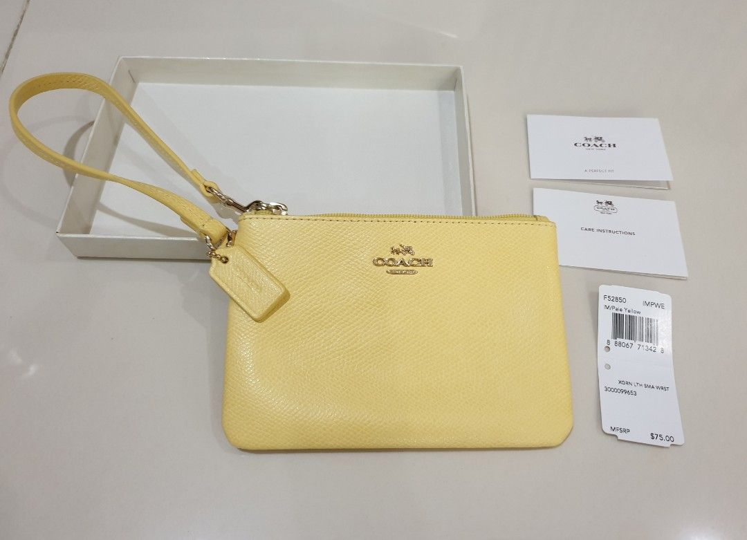 Yellow coach wristlet top