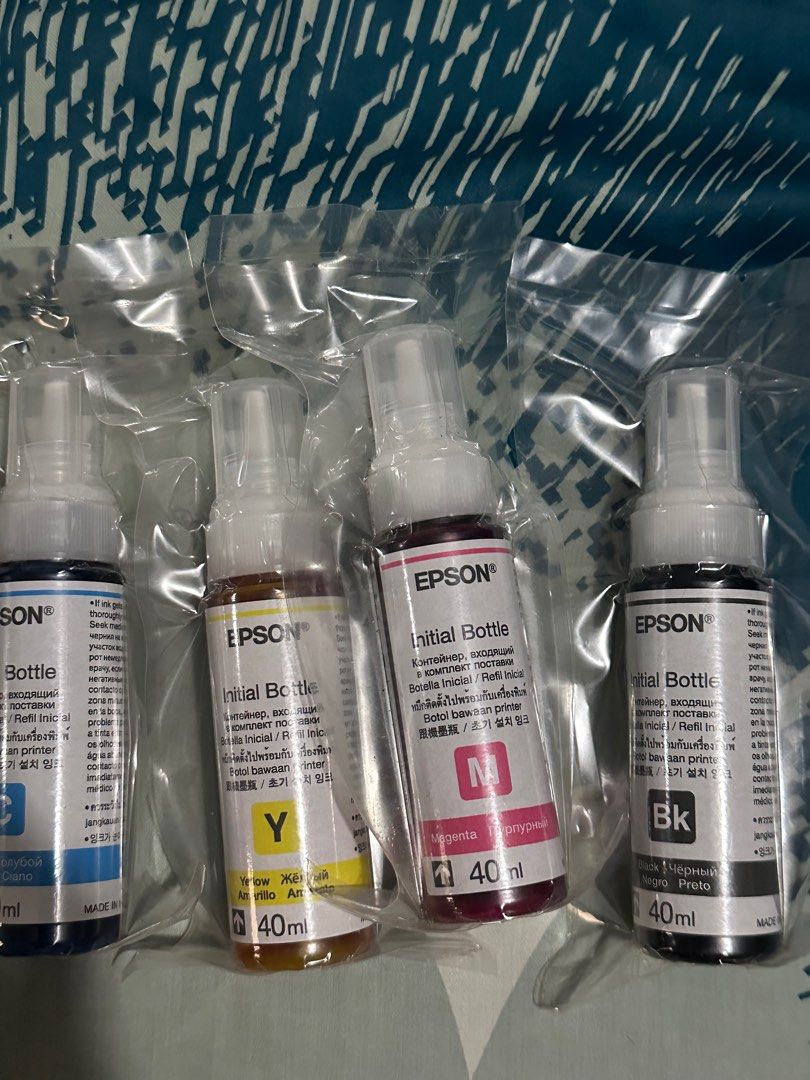 Epson L121 initial ink (Category: Printers, Scanners & Copiers) located in Davao. Submitted by handmedown_shop_ph (Listing ID 1262944743, Image 1). Description: Brand New Sealed not using sold as set -4 complete colors - Initial inks.