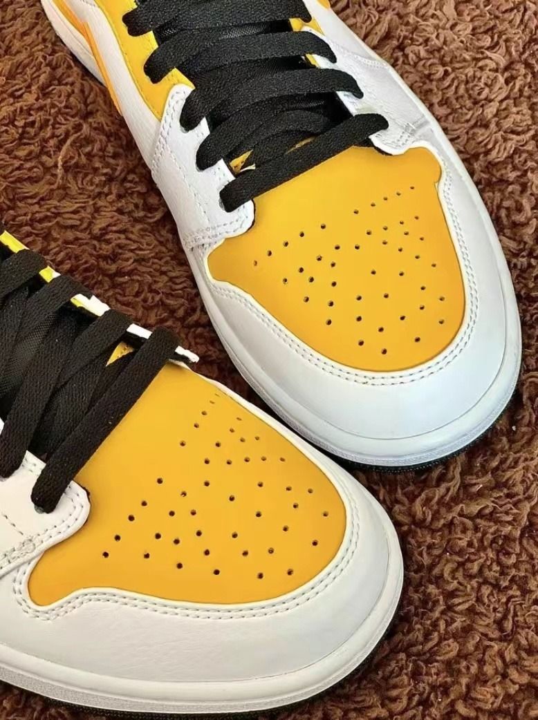 Nike air jordan 1 university hotsell gold