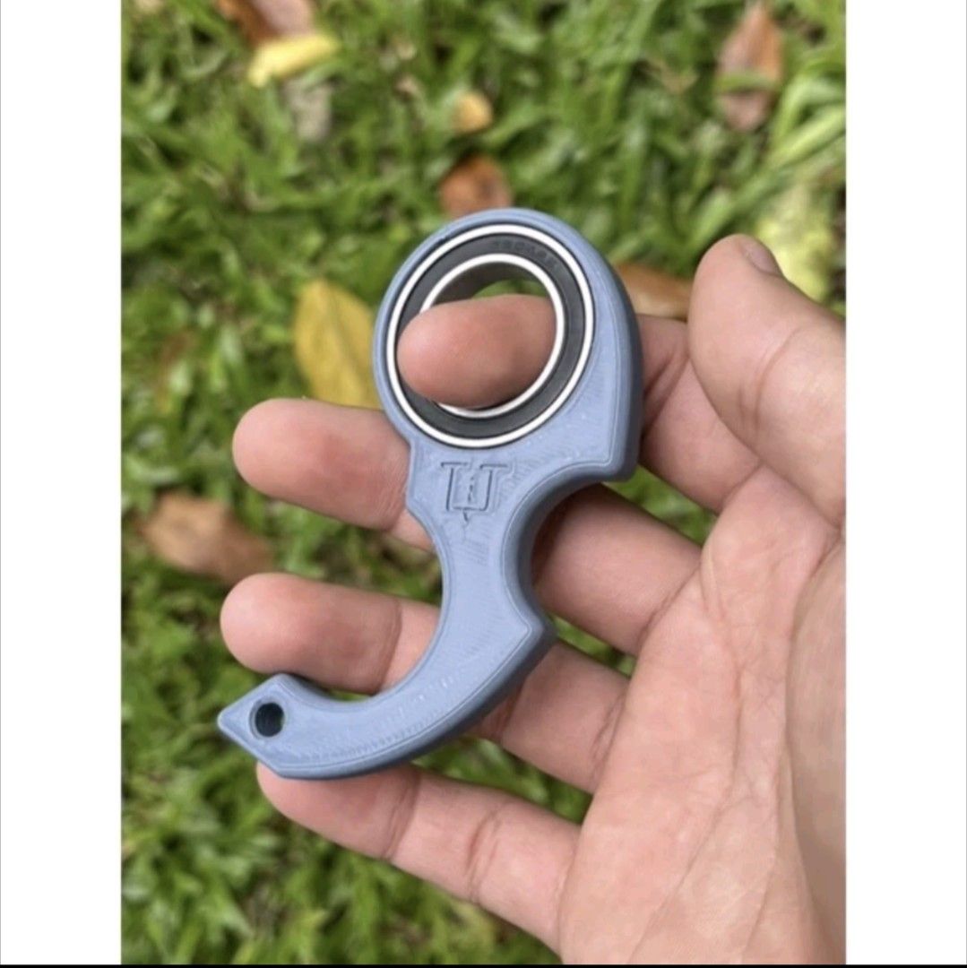 Keyrambit keychain spinner fidget toy collectible karambit keychain, Mobile  Phones & Gadgets, Other Gadgets on Carousell, Keychain Spinner 
