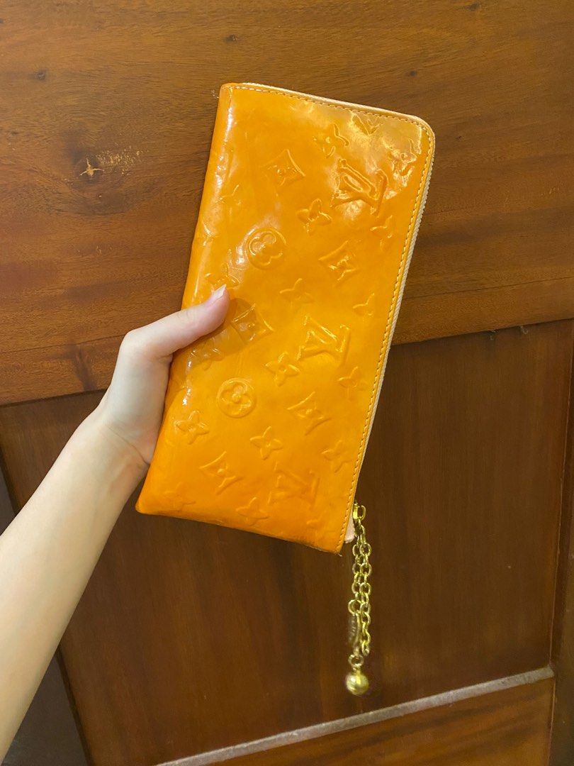 Clutch bag Louis Vuitton Orange in Plastic - 27971521