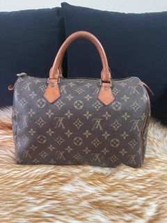 Louis Vuitton Louise defect (LV metal logo)? Tarnish? Rust? Stain?