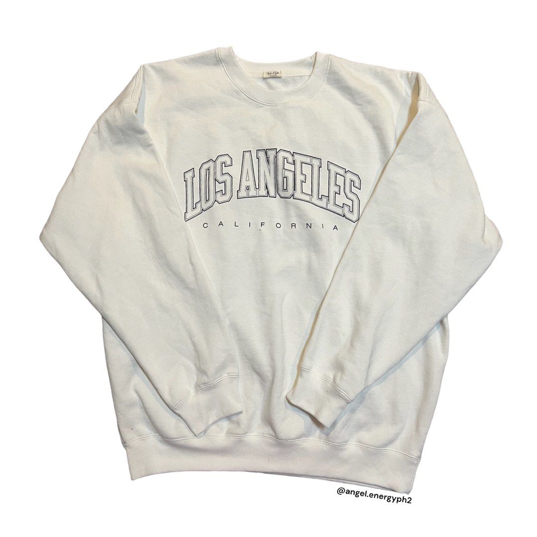 ONHAND Brandy Melville Erica White Los Angeles Sweatshirt w flaw Women s Fashion Coats Jackets and Outerwear on Carousell