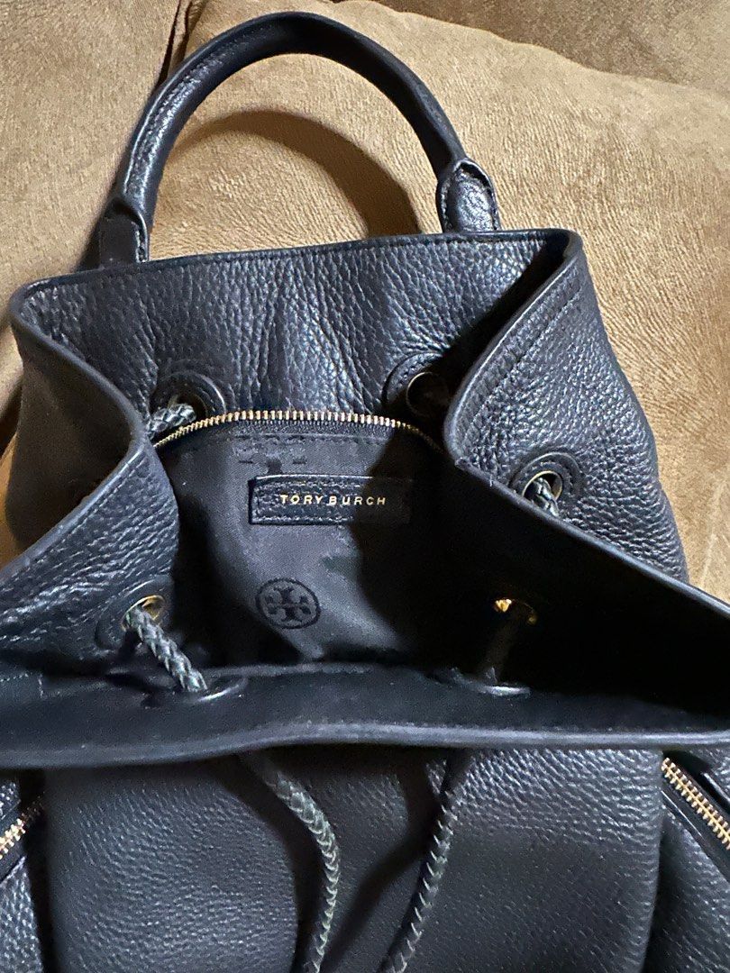 Original Toryburch backpack (Category: Luxury Bags & Wallets) located in Naga. Submitted by bag.net (Listing ID 1262954395, Image 3). Description: Guaranteed original 💯 Toryburch backpack Moneyback if proven fake Still in very good condition/like new Materials: Made of genuine leather and hardwares: made of brass gold Looks stunning in actual😍.