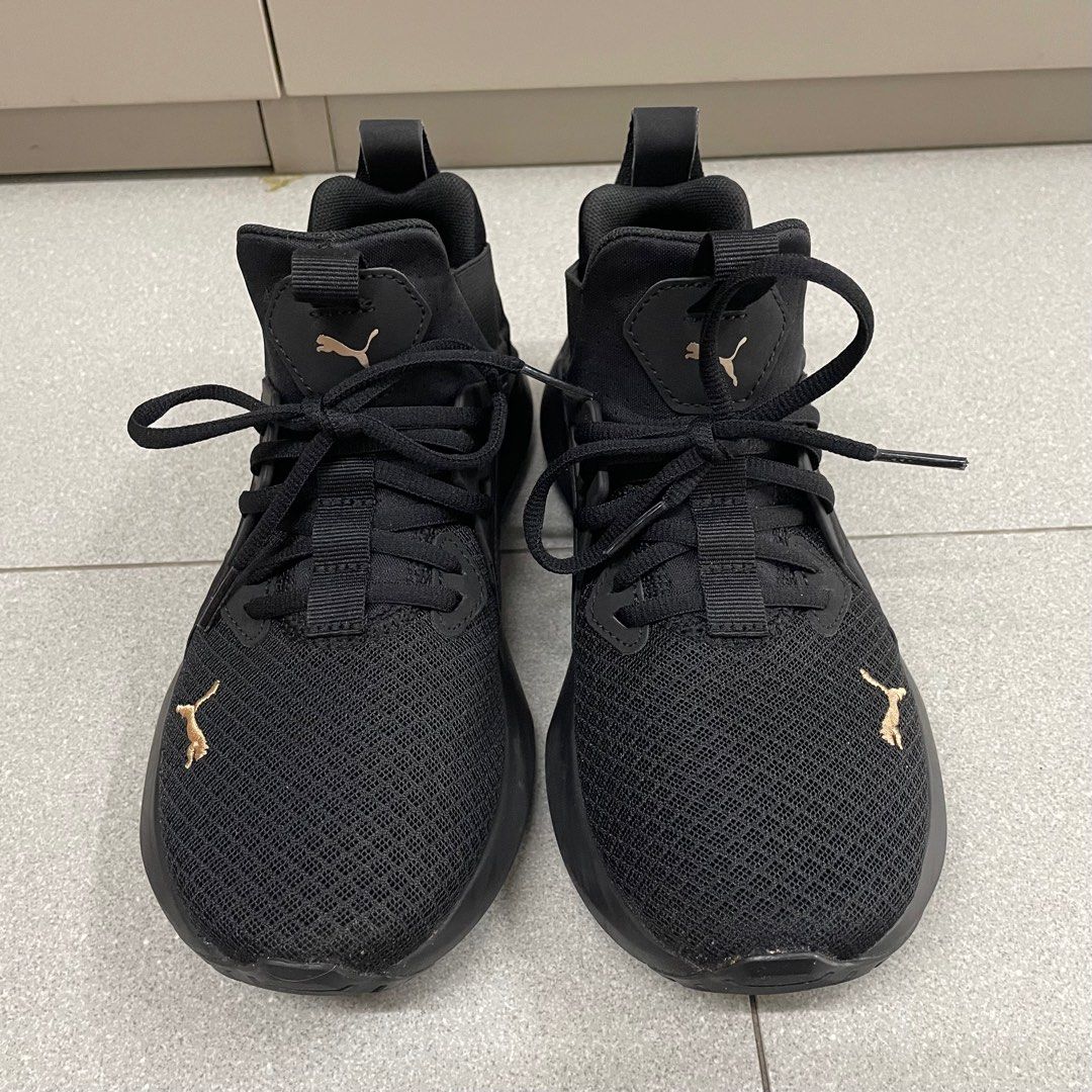 All black top puma running shoes