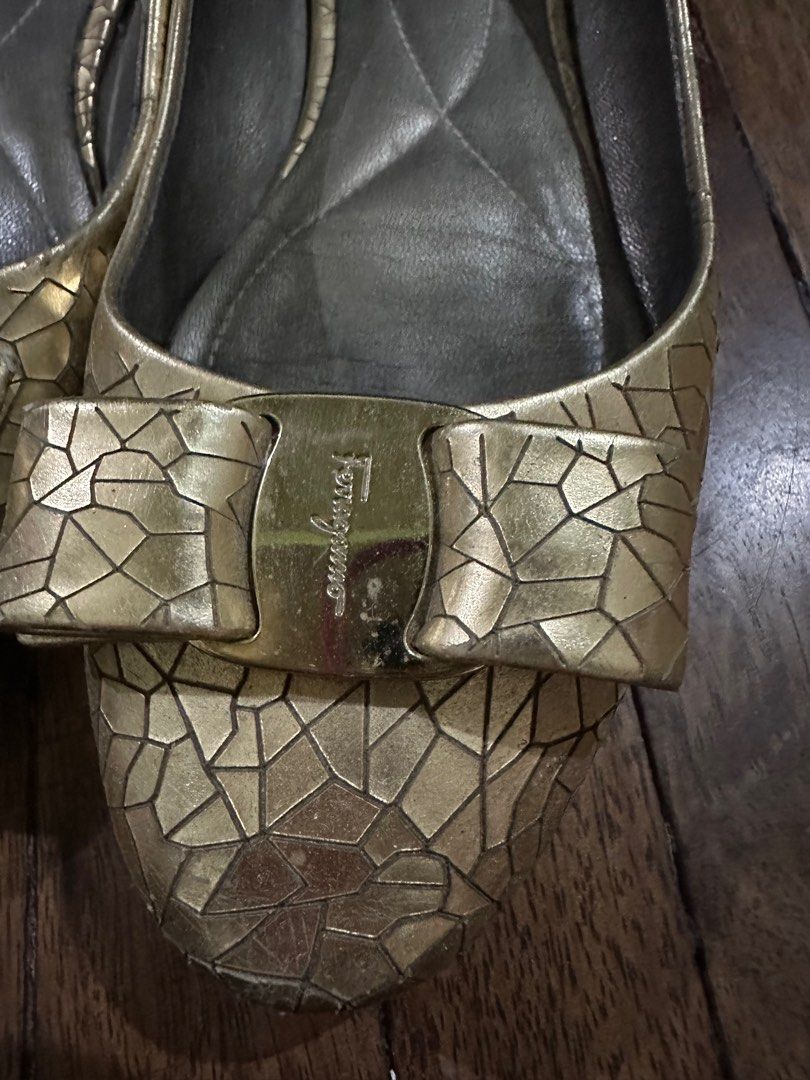 Salvatore Ferragamo Gold flats (Category: Flats & Sandals) located in Manila. Submitted by flutterbycloset (Listing ID 1262949083, Image 2). Description: Salvatore Ferragamo Size 6 gold flats SALE PRICE from 1,000.00 to 500.00.
