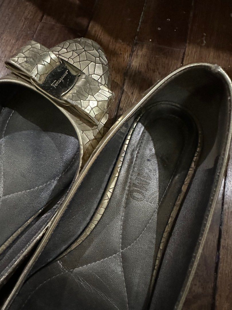 Salvatore Ferragamo Gold flats (Category: Flats & Sandals) located in Manila. Submitted by flutterbycloset (Listing ID 1262949083, Image 3). Description: Salvatore Ferragamo Size 6 gold flats SALE PRICE from 1,000.00 to 500.00.