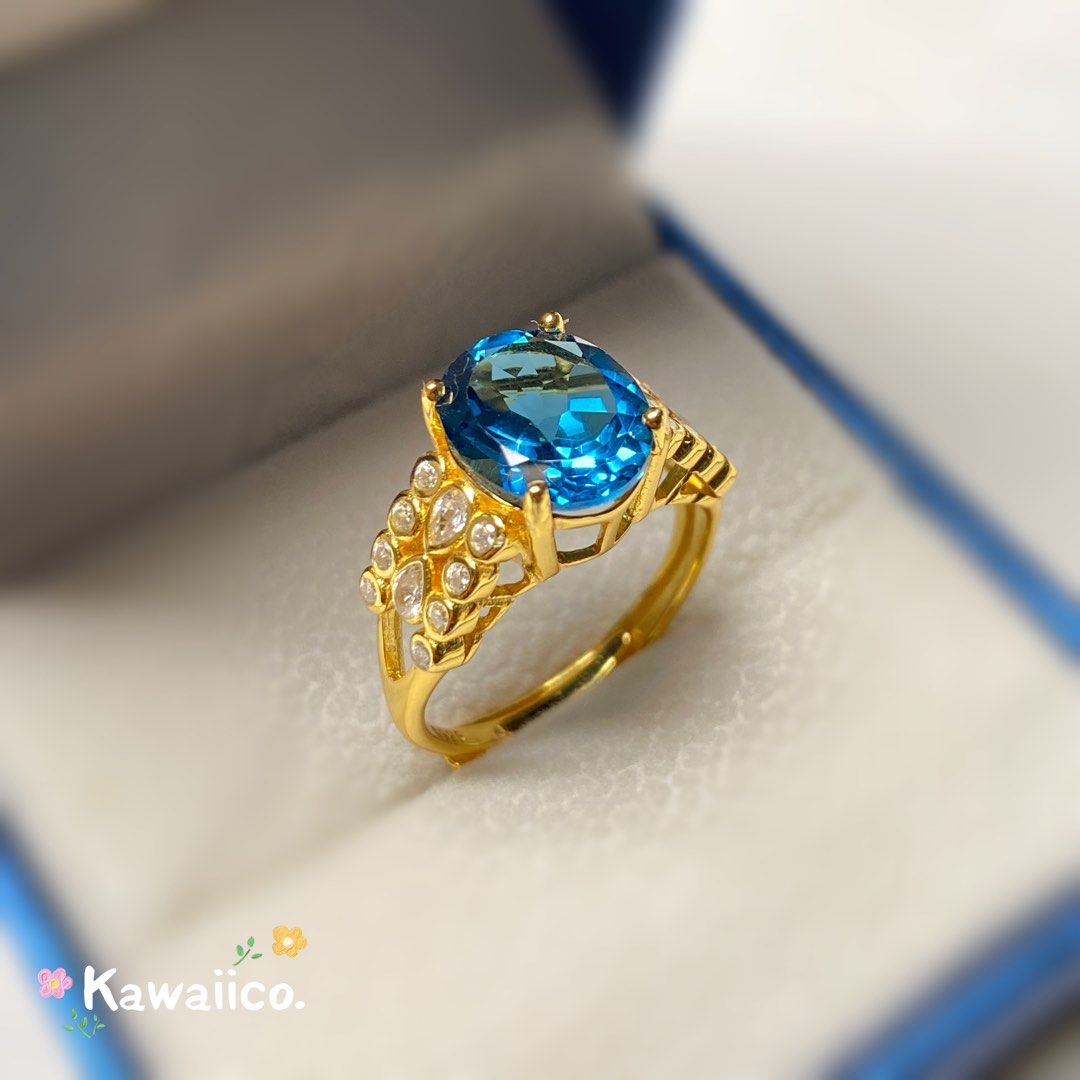Gold ring with topaz stone store