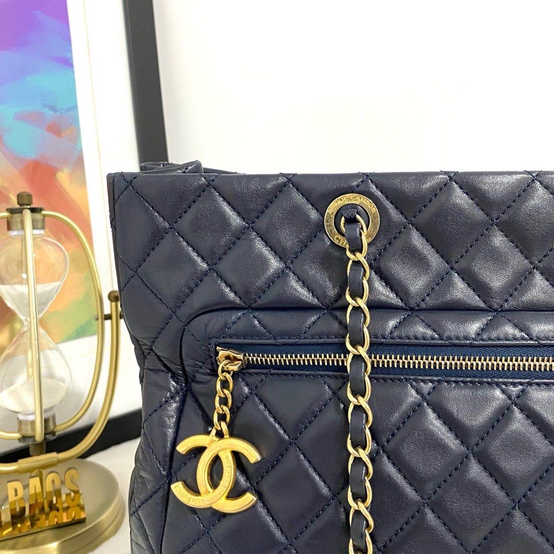 💯% Authentic Chanel Navy Blue Quilted Lambskin Tote Bag in GHW, Luxury,  Bags & Wallets on Carousell