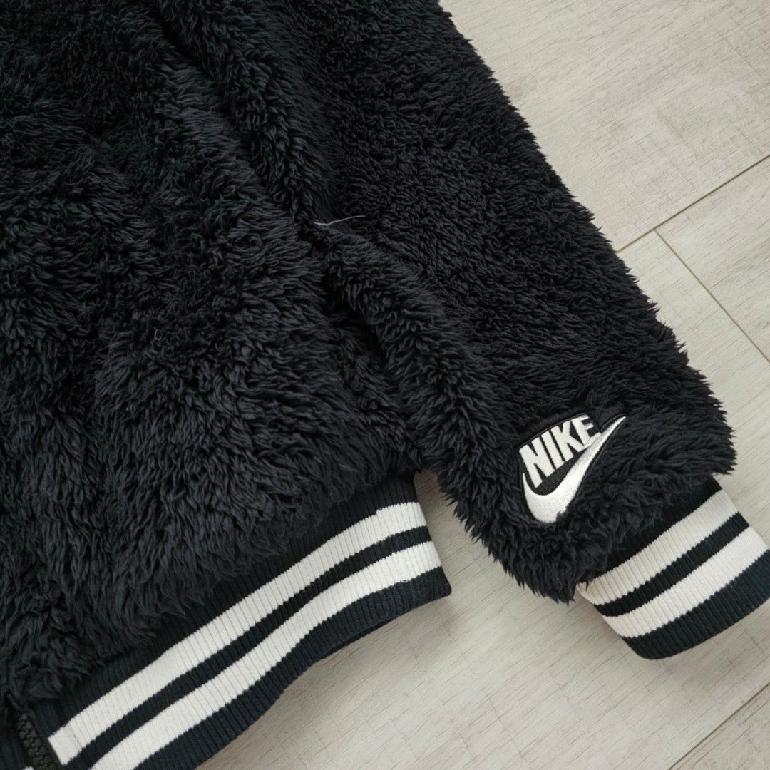 black fuzzy nike jacket