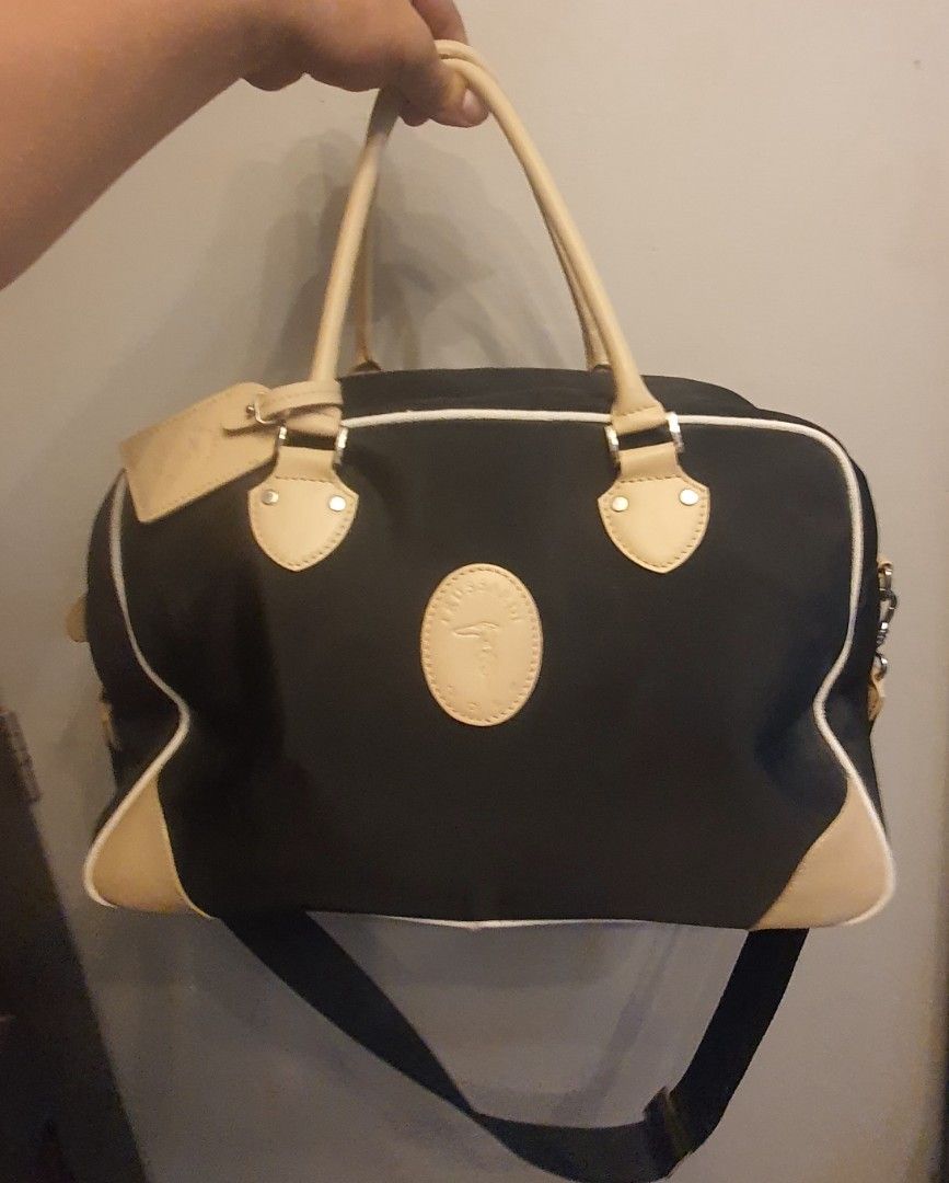 Authentic trussardi 2 way bag (Category: Luxury Bags & Wallets) located in Cavite. Submitted by ohmie23 (Listing ID 1263136406, Image 1). Description: Authentic trussardi 2 way bag.