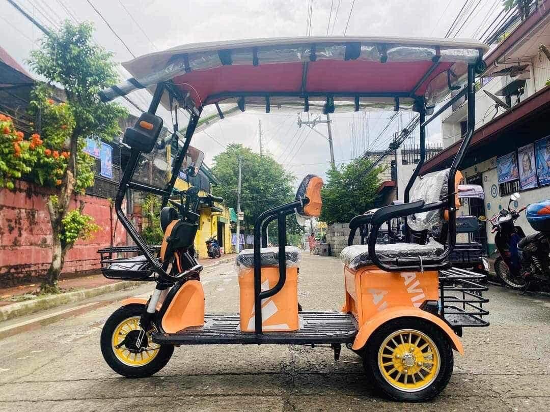 AVIA 3 WHEELs E-TRIKE ‼️ (Category: Bicycles) located in Manila. Submitted by zainabonlineshop (Listing ID 1263166063, Image 2). Description: AVIA 3WHEELS E-TRIKE ‼️ ✅ FREE TRAPAL ✅ FREE DEMO & ASSEMBLE ✅ FREE SIDE MIRROR ✅ FREE AUTOMATIC WIPER ✅ WITH CERTIFICATE OF OWNERSHIP Available Colors: Green / Red / Chameleon Purple / Black / Grey / Orange Specs: ⬇️⬇️⬇️ Digital gauge w/ speedometer Removable battery With Anti theft system WITH BASKET FRON