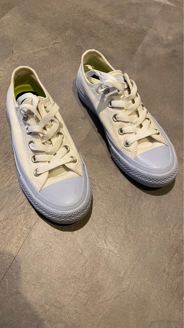 White converse top with gold tongue