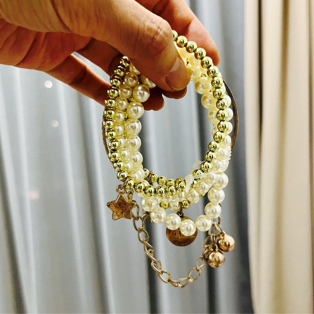Gold pearl top bracelet designs