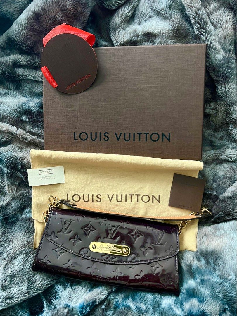 Sunset boulevard patent leather handbag Louis Vuitton Blue in Patent  leather - 25972525
