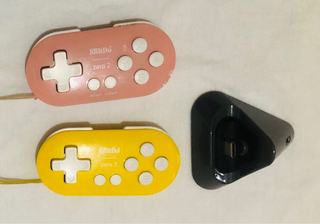 Nintento Switch Lite - Turquoise (with 2 controllers included) (Category: Nintendo) located in Manila. Submitted by maui84 (Listing ID 1263029907, Image 2). Description: - Item was used 3 times only - Inclusions: Original Charger, Charging Stand, 2 8BitDo Controllers (Yellow and Pink), Nintendo Switch Lite Bag (Black), Nintendo Switch Lite Original Box - Free games included: Snipperclips, Asphalt Legends, Amnesia, Resident Evil 6, Pokemon Unite, 