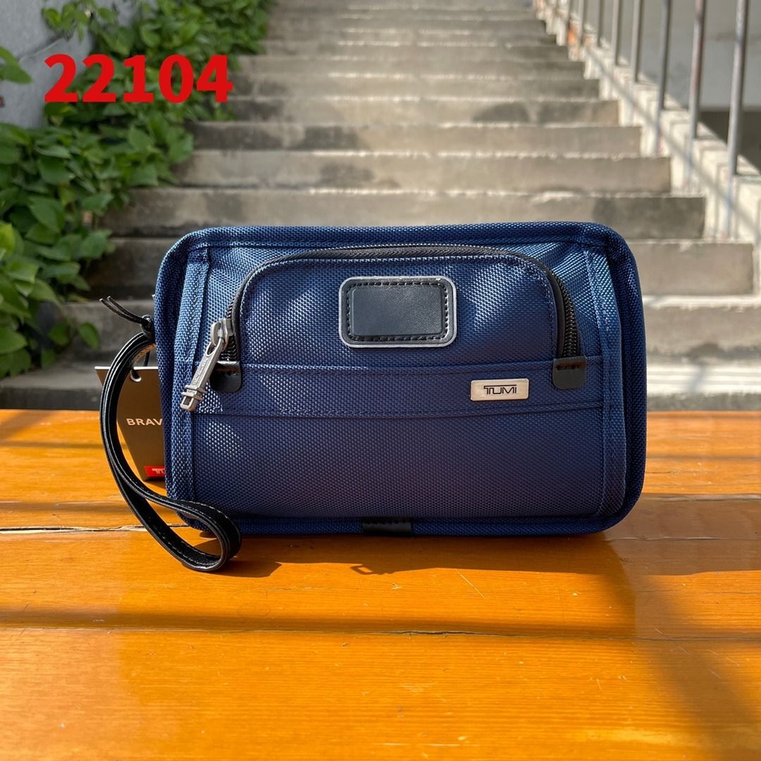 Tumi men's clutch bag deals