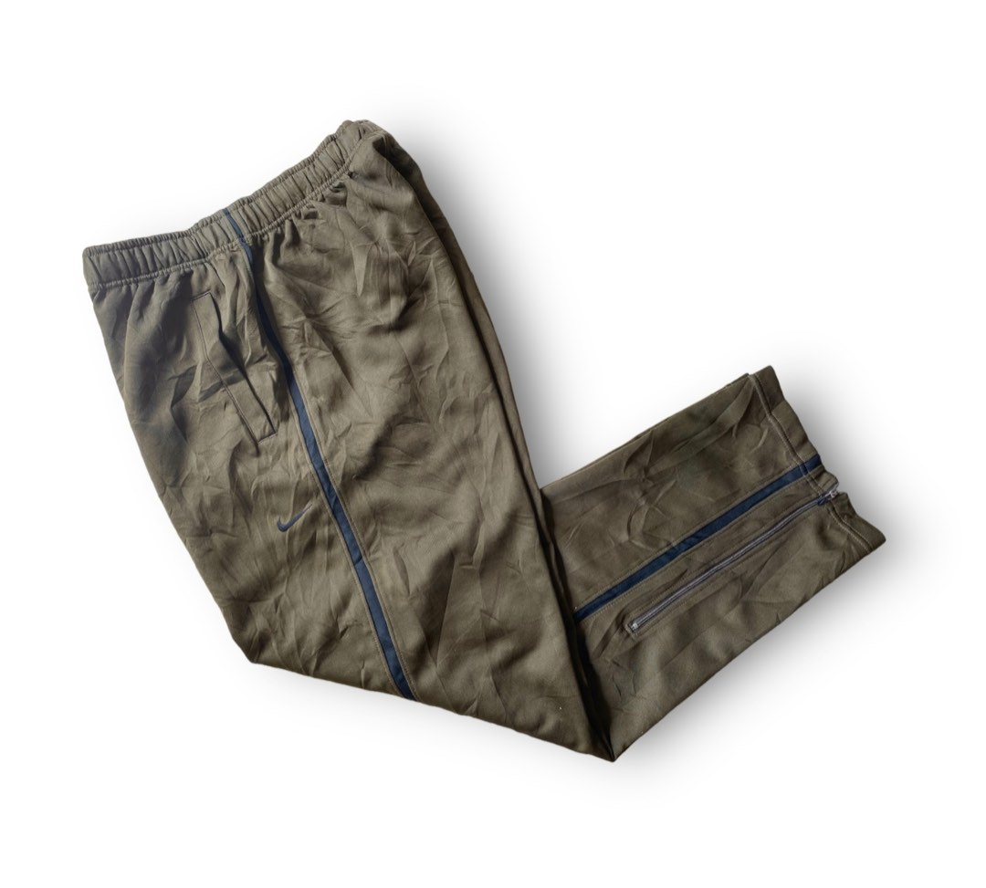 Nike track pants sizing hot sale