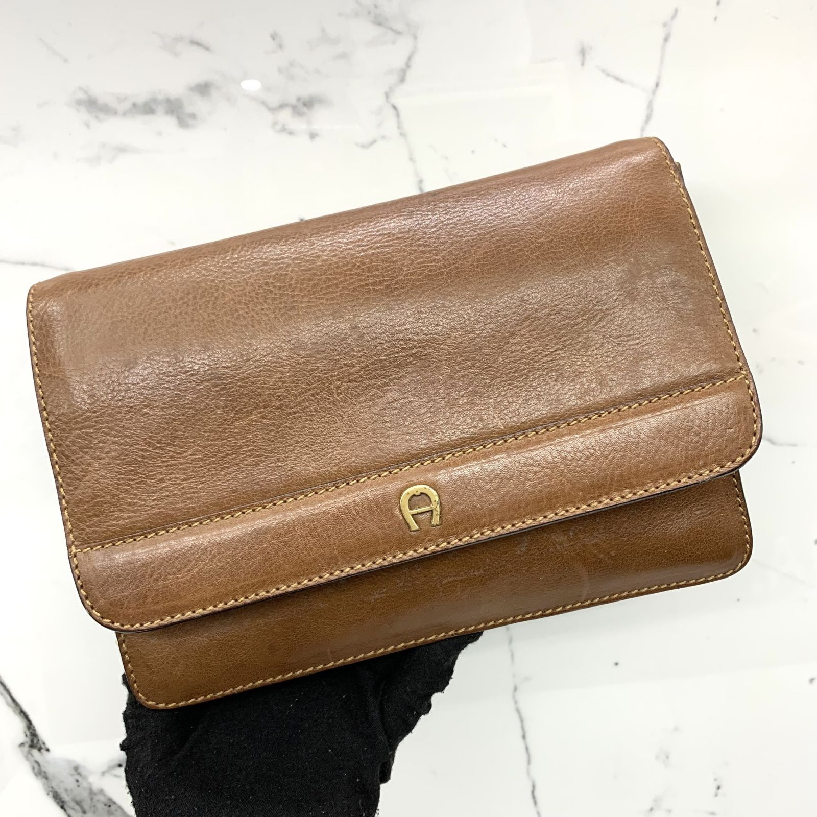 Aigner clutch bag shop