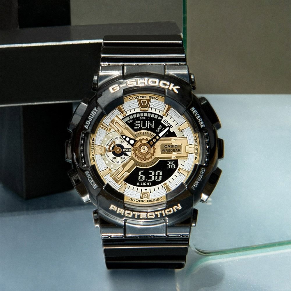 G shock gold black deals watch