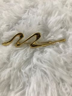 YSL The Gold brooch with print