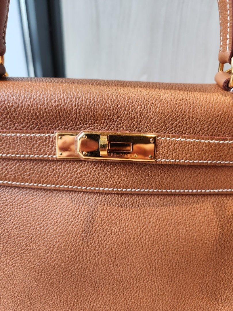 Hermès Kelly 28 Retourne Feu Orange Togo leather Gold Hardware
