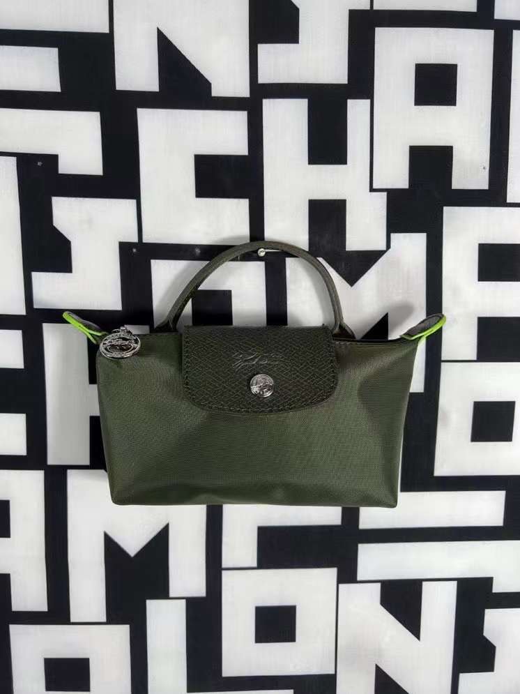 longchamp mini Bag mini clutch forest green instock, Women's Fashion, Bags  & Wallets, Clutches on Carousell
