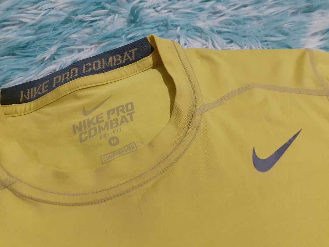 Nik Pro Combat Top, Women's Fashion, Activewear on Carousell