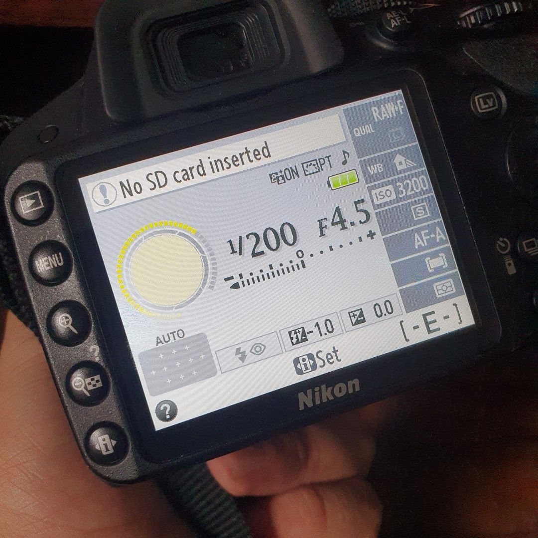Nikon D3200 (with extra lens, bag, and tripod) (Category: Cameras) located in Pasig City. Submitted by juliansantos13 (Listing ID 1258273134, Image 3). Description: FS: Nikon D3200 set -VG condition -low shutter count -includes 18-55 and 55-200 lenses (no scratches/fungus, AF working) and a lens pouch -LCD is bright (no vignetting) -includes Nikon camera bag -includes tripod (63” extended, 24” collapsed) -honest issue: ports cover is missing (see