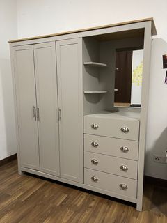 Combi wardrobe with online dressing unit