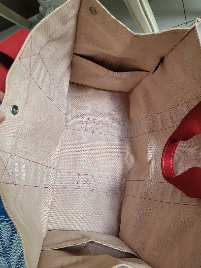 Authentic Hermes Bora Bora Large Tote (Category: Luxury Bags & Wallets) located in Manila. Submitted by lp1216 (Listing ID 1258476857, Image 3). Description: Authentic Hermes Bora Bora Large Canvass Tote GM size or bigger than the large book tote of Dior No holes, no rip, no rubs and corners are almost immaculate Very minor dirt (unnoticeable) With 2 pockets inside Buttons are embosed with Hermes With Hermes tag inside Bag as you can see on the p