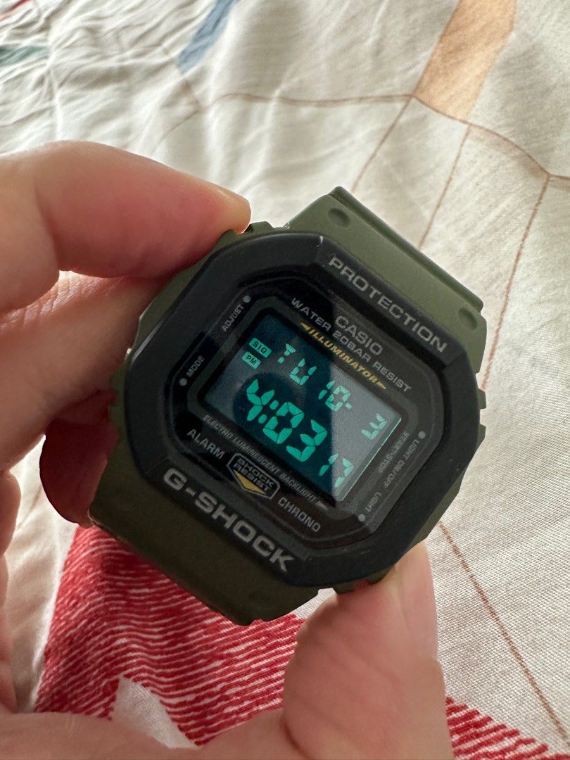 Casio g shock muted green colour Men s Fashion Watches