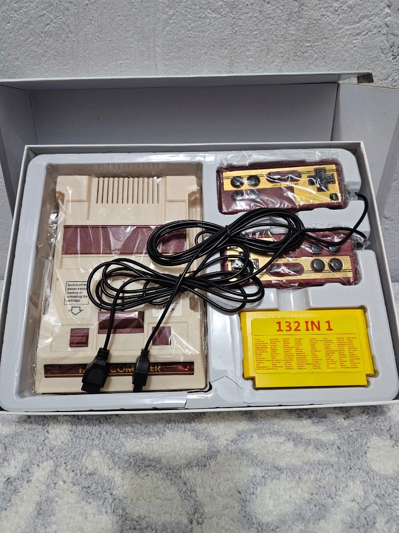 FC Compact Vintage Family Computer (Category: Nintendo) located in Baguio. Submitted by thriftfinds_2600 (Listing ID 1258413452, Image 3). Description: Item is unused, but box is not in very good condition. Complete accesories. With 132 in 1 game. Please check all photos for details. MOP: Gcash MOD: Flash.