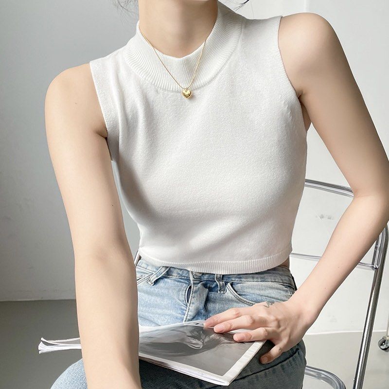 White sleeveless 2024 turtleneck crop top