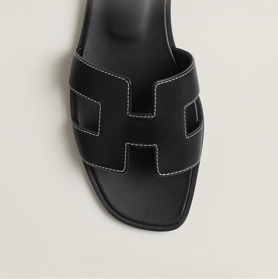 Hermes black slides sales