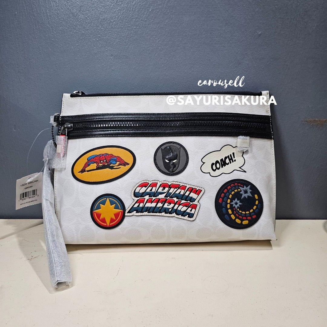 READY STOCK MY Coach Marvel Carryall Pouch In Signature Canvas