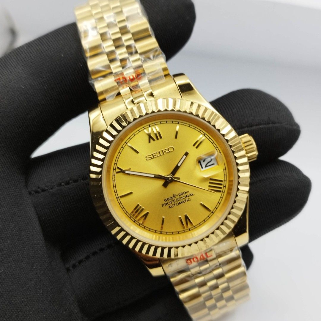 Seikolex date just gold (Category: Men's Watches) located in Quezon City. Submitted by WatchProject (Listing ID 1258401258, Image 3). Description: watch is personally build/customized and not affiliated to it's brand or any page specs and premium parts used original 7s26 movement newly overhauled and oiled movement aftermarket gold plated pvd base, strap jubilee solid links and endlinks , dial and hands sapphire glass 41mm case dm hacking and win