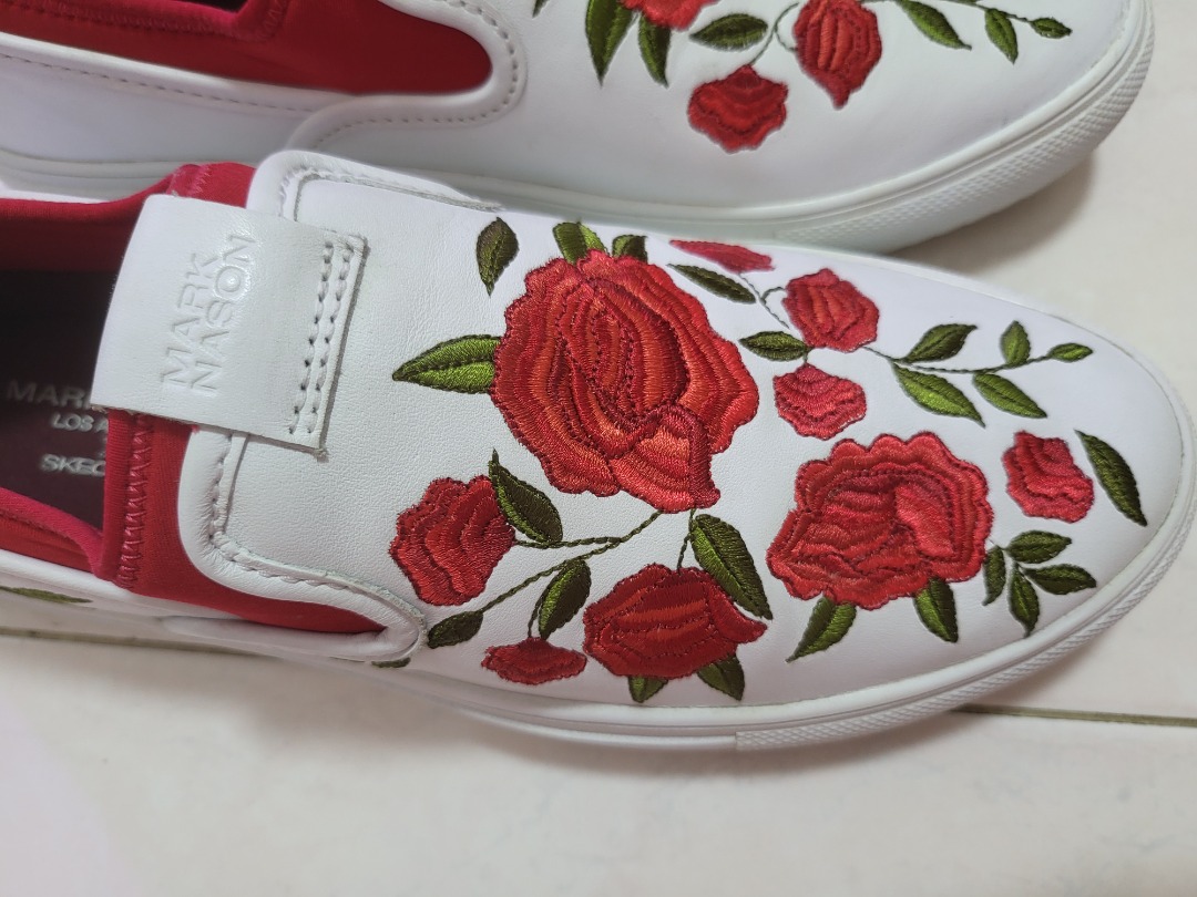White slip on new arrivals vans with roses