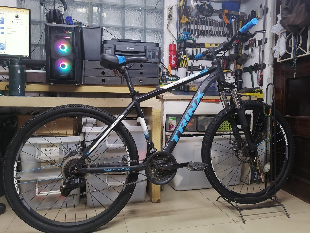 trinx mountain bike blue