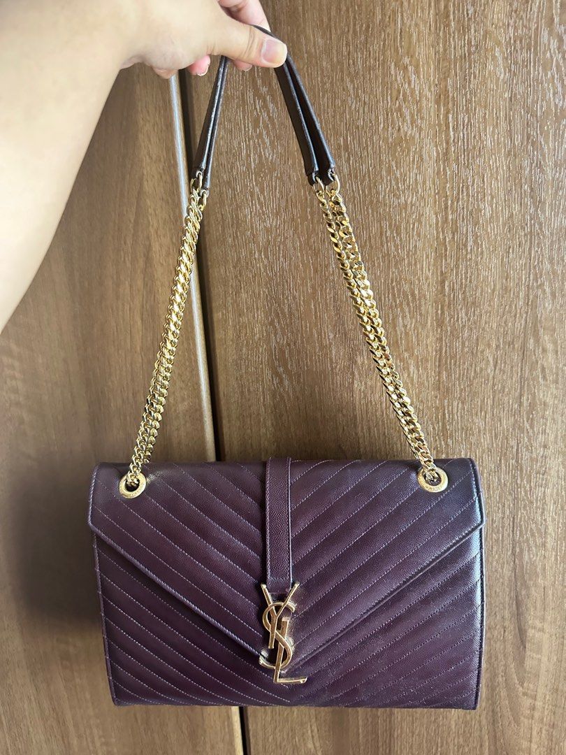 Authentic YSL Caviar Large Envelope Bag (open for layaway) (Category: Luxury Bags & Wallets) located in Rizal. Submitted by SummerPeaCloset (Listing ID 1258626883, Image 1). Description: Authentic YSL Envelope Bag Color Burgundy .