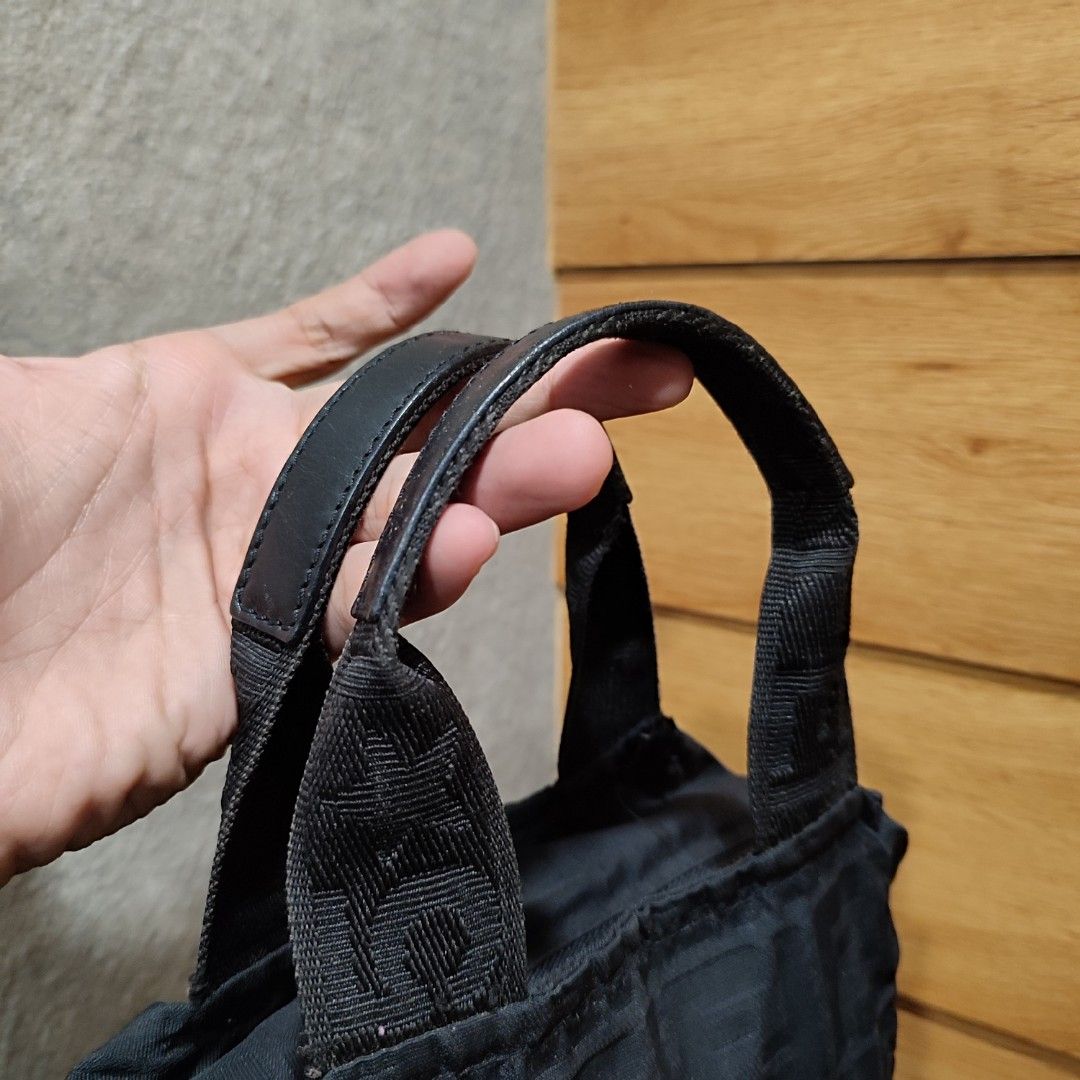 Fendi Black FF mono mini Pochette (Category: Luxury Bags & Wallets) located in Taytay. Submitted by highendmnl (Listing ID 1258708391, Image 3). Description: Fendi Black mono Mini Pochette pm for more details.