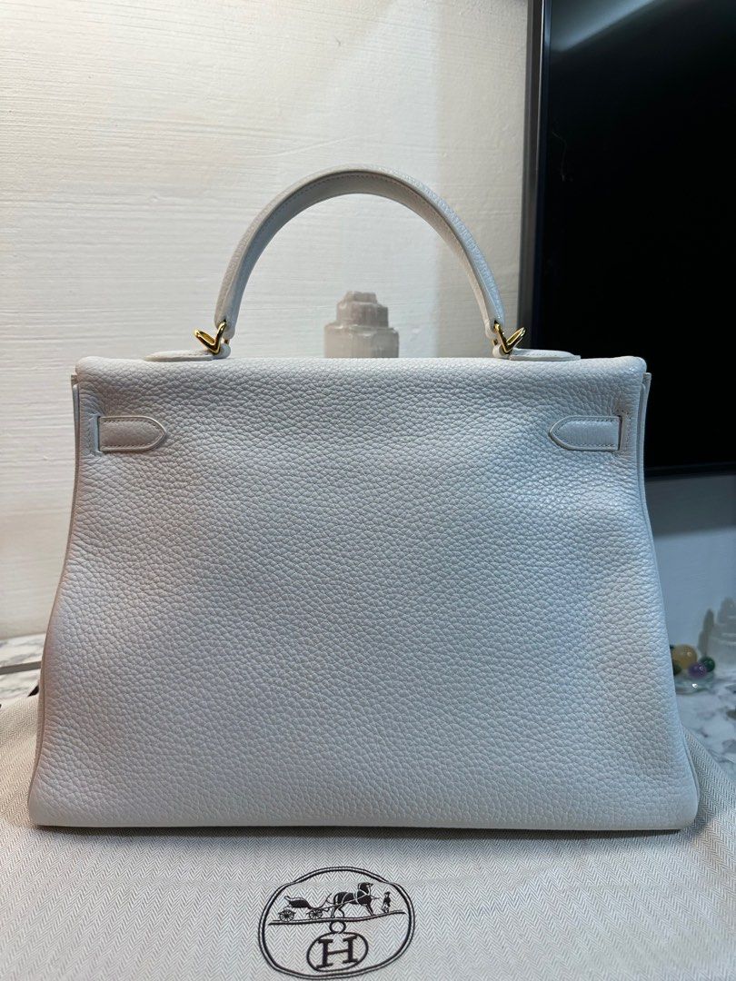 ec24m has #Hermes kelly 35 retourne teddy shearling & ebene