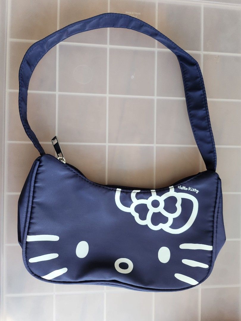 Blue hello kitty purse hotsell
