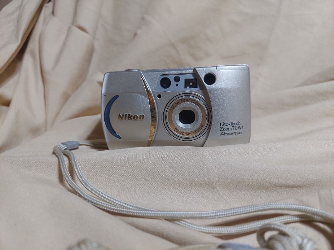 Nikon Lite Touch Zoom 70ws (35mm Format) (Category: Cameras) located in Puerto Princesa. Submitted by jessagalicia5834 (Listing ID 1258699292, Image 3). Description: Conditions: -Fully Functional -Mininal to unnoticeable scratches -All keys/buttons are working -Bought in a Japan Surplus in this state with box Specs: 35mm film format Coated Nikon Zoom Macro 28-70mm Flash Mode Self Timer Built-in Flash Optical Viewfinder LCD Display (Modes and Film